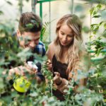 Image,Of,Two,Amazing,Gardeners,Posing,In,The,Nature,Greenhouse